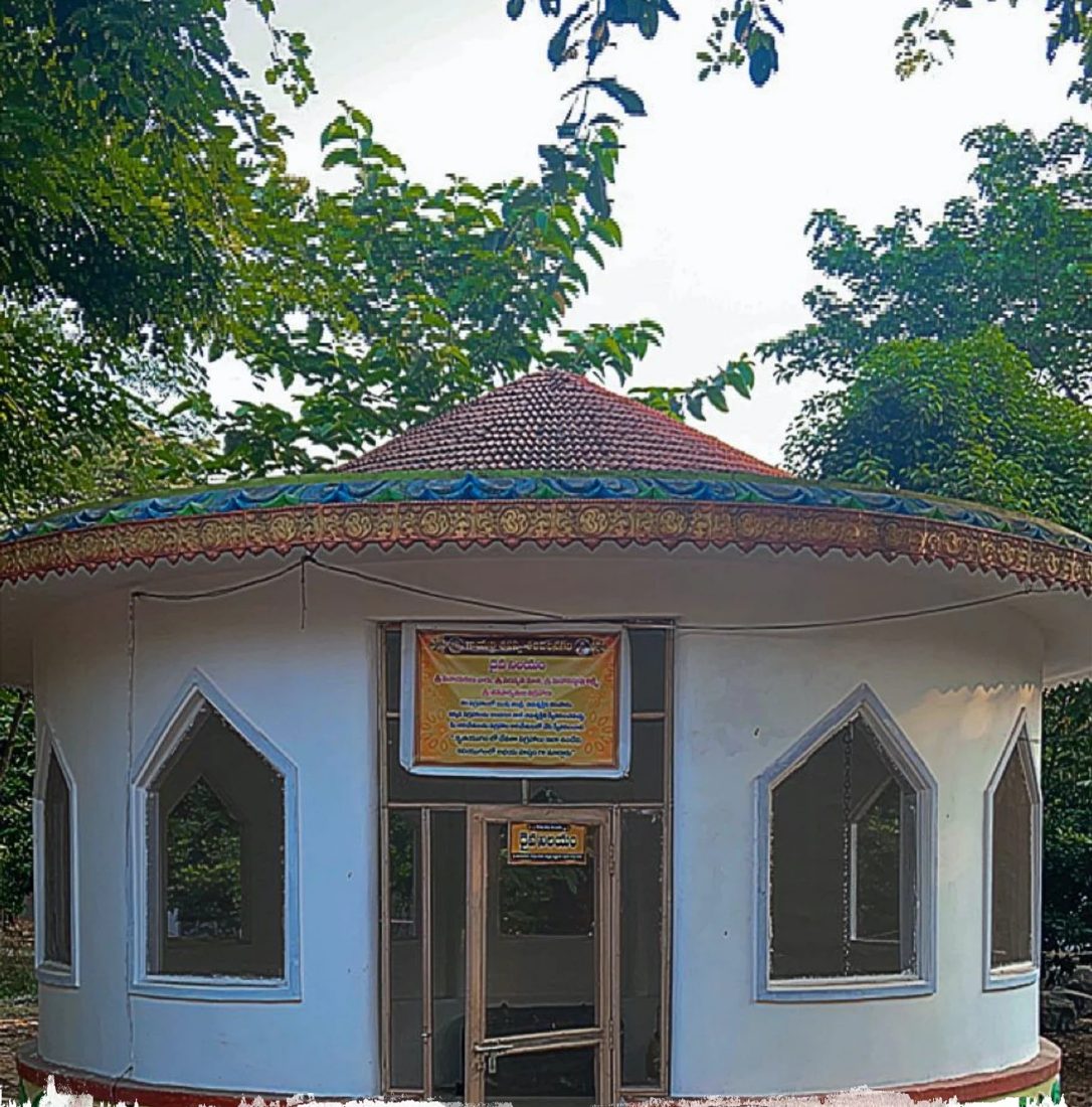 The round white Daiva Nilayam building