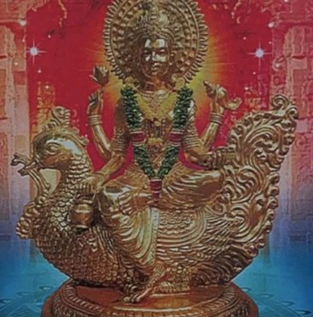 Idol of Gayatri Mata seated on her swan